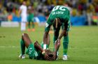 FORTALEZA, BRAZIL - JUNE 24: A dejected Giovanni Sio of the Ivory Coast is consoled by teammate Die Serey after being defeated by Greece 2-1 during the 2014 FIFA World Cup Brazil Group C match between Greece and the Ivory Coast at Castelao on June 24, 2014 in Fortaleza, Brazil.  (Photo by Jamie McDonald/Getty Images)