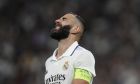 Real Madrid's Karim Benzema reacts during the Champions League group F soccer match between Real Madrid and Shakhtar Donetsk at the Santiago Bernabeu stadium in Madrid, Wednesday, Oct. 5, 2022. (AP Photo/Bernat Armangue)
