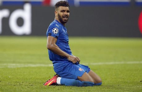 Zagreb's El Arabi Hilal Soudani reacts after missing a chance to score during the Champions League group H soccer match between Olympique Lyonnais and Dinamo Zagreb in Decines, near Lyon, central France, Wednesday, Sept. 14, 2016. (AP Photo/Thibault Camus)