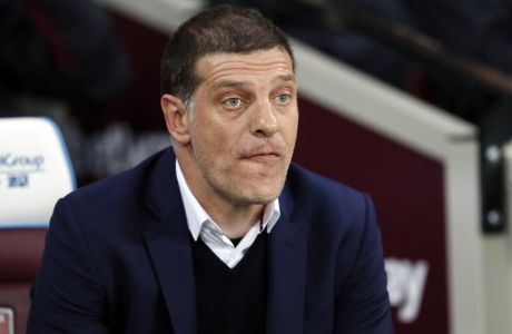 West Ham's manager Slaven Bilic watches the action during the English Premier League soccer match between West Ham United and Tottenham Hotspur at the London Stadium in London, Friday, May 5, 2017. (AP Photo/Kirsty Wigglesworth)