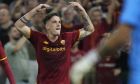 Roma's Nicolo Zaniolo celebrates after scoring his side's opening goal during the Europa Conference League final between AS Roma and Feyenoord at National Arena in Tirana, Albania, Wednesday, May 25, 2022. (AP Photo/Antonio Calanni)
