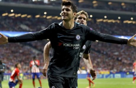 Chelsea's scorer Alvaro Morata, front, and his teammate Marcos Alonso, rear, celebrate their side's first goal during a Champions League group C soccer match between Atletico Madrid and Chelsea at the Wanda Metropolitano stadium in Madrid, Spain, Wednesday, Sept. 27, 2017. (AP Photo/Francisco Seco)