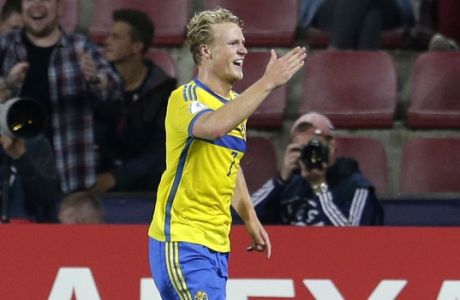 Swedens Oscar Hiljemark celebrates after scoring his side's 4rth goal during the Euro U21 soccer championship semifinal match between Denmark and Sweden, at the Letna stadium in Prague, Czech Republic, Saturday, June 27, 2015. Sweden defeated Denmark by 4-1. (AP Photo/Petr David Josek)