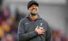 Liverpool's manager Jurgen Klopp celebrates after the English Premier League soccer match between Brentford and Liverpool at the Gtech Community Stadium in London, Saturday, Feb. 17, 2024. Liverpool won 4-1.(AP Photo/Kirsty Wigglesworth)