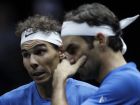 Europe's Roger Federer, right, and Rafael Nadal, left, talk during their Laver Cup doubles tennis match against World's Jack Sock and Sam Querrey in Prague, Czech Republic, Saturday, Sept. 23, 2017. (AP Photo/Petr David Josek)