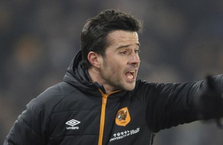 Hull City manager Marco Silva gestures during the English League Cup, Semi Final Second Leg soccer match between Hull City and Manchester United at KCOM stadium in Hull, England, Thursday Jan. 26, 2017. (AP Photo/Rui Vieira)