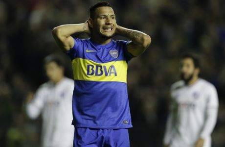 Andres Chavez of Argentina's Boca Juniors reacts after failing to score during a Copa Libertadores soccer match against Nacional of Uruguay in Buenos Aires, Argentina, Thursday, May 19, 2016. (AP Photo/Victor R. Caivano)