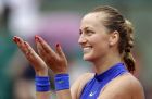 Petra Kvitova of the Czech Republic thanks the crowd after defeating Julia Boserup, of the U.S, in their first round match of the French Open tennis tournament at the Roland Garros stadium, Sunday, May 28, 2017 in Paris. (AP Photo/Petr David Josek)