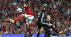 Benfica's Raul Jimenez, left, jumps for the ball with Manchester United's Victor Lindelof during their Champions League group A soccer match between Manchester United and Benfica at Benfica's Luz stadium in Lisbon, Wednesday, Oct. 18, 2017. (AP Photo/Armando Franca)