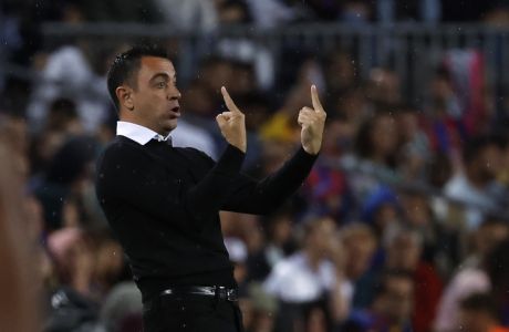Barcelona's head coach Xavi Hernandez gives instructions from the side line during a Spanish La Liga soccer match between Barcelona and Real Betis at the Camp Nou stadium in Barcelona, Spain, Saturday, April 29, 2023. (AP Photo/Joan Monfort)