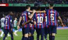 Barcelona players celebrates after Betis' Guido Rodriguez scored an own goal during a Spanish La Liga soccer match between Barcelona and Real Betis at the Camp Nou stadium in Barcelona, Spain, Saturday, April 29, 2023. (AP Photo/Joan Monfort)