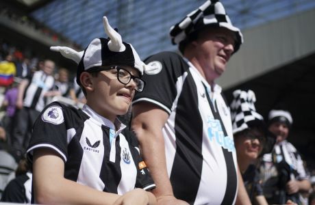 Newcastle fans await kick off before the English Premier League soccer match between Newcastle United and Liverpool at St. James' Park stadium in Newcastle, England, Saturday, April 30, 2022. (AP Photo/Jon Super)