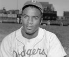 FILE - This is an April 18, 1948, portrait of Brooklyn Dodgers baseball player Jackie Robinson. The first statue in Dodger Stadium history belongs to Jackie Robinson. The team will unveil his likeness during Jackie Robinson Day festivities on Saturday, April 15, 2017, with his wife and extended family in attendance on the 70th anniversary of him breaking baseball's color barrier (AP Photo/File)
