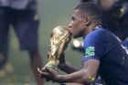 France's Kylian Mbappe kisses the trophy after the final match between France and Croatia at the 2018 soccer World Cup in the Luzhniki Stadium in Moscow, Russia, Sunday, July 15, 2018. (AP Photo/Natacha Pisarenko)