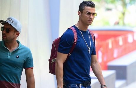 Cristiano Ronaldo and Girlfried Irina Shayk were spotted out in NYC on Sunday. Cristiano and a few friends headed to practice with his soccer team, while Irina went for a walk. She blew him a large kiss goodbye as they parted ways. She stunned in a black tee, jean short shorts and a vibrant blue purse.
<P>
Pictured: Cristiano Ronaldo 
<P><B>Ref: SPL777487  080614  </B><BR/>
Picture by: 247PapsTV / Splash News<BR/>
</P><P>
<B>Splash News and Pictures</B><BR/>
Los Angeles:	310-821-2666<BR/>
New York:	212-619-2666<BR/>
London:	870-934-2666<BR/>
photodesk@splashnews.com<BR/>
</P>