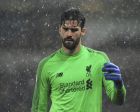 Liverpool's Alisson Becker reacts during the English Premier League soccer match between Wolverhampton Wanderers and Liverpool at the Molineux Stadium in Wolverhampton, England, Friday, Dec. 21, 2018. (AP Photo/Rui Vieira)