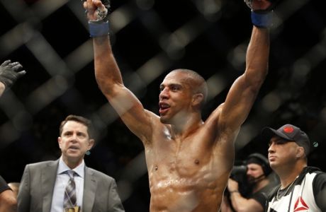 Edson Barboza celebrates after defeating Anthony Pettis during a lightweight mixed martial arts bout at UFC 197, Saturday, April 23, 2016, in Las Vegas. (AP Photo/John Locher)