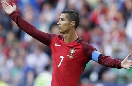 Portugal's Cristiano Ronaldo calls for referee's attention during the Confederations Cup, Group A soccer match between Portugal and Mexico, at the Kazan Arena, Russia, Sunday, June 18, 2017. (AP Photo/Thanassis Stavrakis)