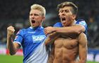 In this Friday Dec. 12, 2014 picture Hoffenheim's Roberto Firmino . right, celebrates his side's third goal with teammate  Andreas Bec, left,   during the German first division Bundesliga soccer match between TSG 1899 Hoffenheim and Eintracht Frankfurt, in Sinsheim, Germany. Hoffenheim won by 3-2. (AP Photo/dpa,Uwe Anspach)