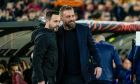 Roma's head coach Daniele De Rossi, right, greets Brighton's head coach Roberto De Zerbi prior to the Europa League round of sixteen first leg soccer match between Roma and Brighton and Hove Albion, at Rome's Olympic Stadium, Thursday, March 7, 2024. (AP Photo/Alessandra Tarantino)