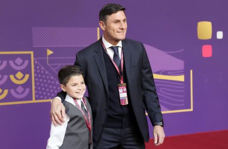 Javier Zanetti, former Argentine soccer great arrives for the 2022 soccer World Cup draw at the Doha Exhibition and Convention Center in Doha, Qatar, Friday, April 1, 2022. (AP Photo/Darko Bandic)