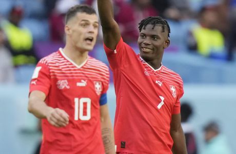 Switzerland's Breel Embolo celebrates after scoring a goal during the World Cup group G soccer match between Switzerland and Cameroon, at the Al Janoub Stadium in Al Wakrah, Qatar, Thursday, Nov. 24, 2022. (AP Photo/Matthias Schrader)