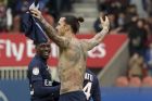 Paris St Germain's Zlatan Ibrahimovic celebrates after scoring a goal against Caen during their French Ligue 1 soccer match at Parc des Princes stadium in Paris, February 14, 2015.  REUTERS/Philippe Wojazer (FRANCE - Tags: SPORT SOCCER) - RTR4PLEL