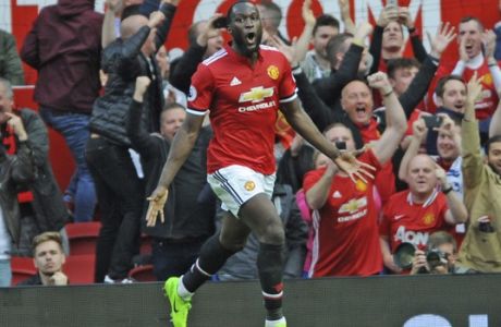 Manchester United's Romelu Lukaku celebrates after scoring his side third goal during the English Premier League soccer match between Manchester United and Everton at Old Trafford in Manchester, England, Sunday, Sept. 17, 2017. (AP Photo/Rui Vieira)