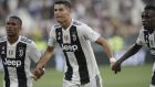 Juventus' Cristiano Ronaldo, centre, celebrates with teammates Juventus' Douglas Costa, left and Juventus' Blaise Matuidi after the end of the Serie A soccer match between Juventus and Lazio at the Allianz Stadium in Turin, Italy, Saturday, Aug. 25, 2018. Juventus won the game 2-0.(AP Photo/Luca Bruno)