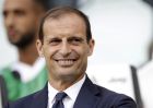 Juventus coach Massimiliano Allegri smiles as he waits in the technical area for the start of the Serie A soccer match between Juventus and Lazio at the Allianz Stadium in Turin, Italy, Saturday, Aug. 25, 2018. (AP Photo/Luca Bruno)