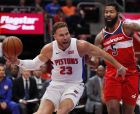 Detroit Pistons forward Blake Griffin (23), defended by Washington Wizards forward Markieff Morris (5), loses control of the ball during the first half of an NBA preseason basketball game Wednesday, Oct. 10, 2018, in Detroit. (AP Photo/Carlos Osorio)