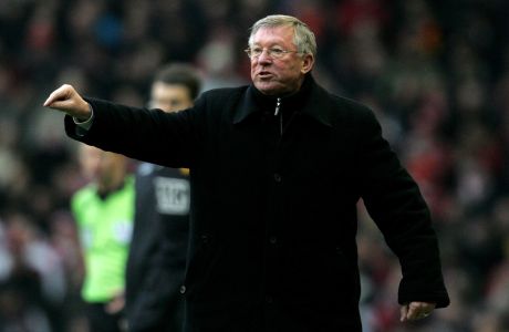 Manchester United's manager Sir Alex Ferguson directs proceedings against Liverpool during their English Premier League soccer match at Anfield Stadium, Liverpool, England, Sunday Dec. 16, 2007. (AP Photo/Paul Thomas)   **NO INTERNET/MOBILE USAGE WITHOUT FOOTBALL ASSOCIATION PREMIER LEAGUE(FAPL)LICENCE. EMAIL info@football-dataco.com FOR DETAILS. **
