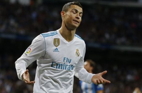 Real Madrid's Cristiano Ronaldo gestures after scoring his side's third goal against Malaga during the Spanish La Liga soccer match between Real Madrid and Malaga at the Santiago Bernabeu stadium in Madrid, Saturday, Nov. 25, 2017. (AP Photo/Francisco Seco)