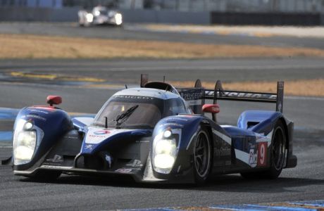 French Sstien Bourdais steers his Peugeot 908, on June 12, 2011 in Le Mans western France, during the 79th edition Le Mans 24 hours endurance race.  AFP PHOTO / ALAIN JOCARD (Photo credit should read ALAIN JOCARD/AFP/Getty Images)