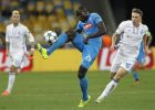Napoli's Kalidou Koulibaly, centre, controls the ball in front of Kiev's Serhiy Sydorchuk during the Champions League Group B soccer match between Dynamo Kiev and Napoli at the Olympiyskiy national stadium in Kiev, Ukraine, Tuesday, Sept. 13, 2016. (AP Photo/Sergei Chuzavkov)
