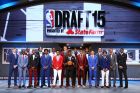BROOKLYN, NY - JUNE 25: Front Row (L-R) Jerian Grant, Rondae Hollis-Jefferson, Justise Winslow,D'Angelo Russell, Emmanuel Mudiay,Kelly Oubre, Devin Booker,Cameron Payne, Back Row (L-R) Sam Dekker,Bobby Portis,Willie Cauley-Stein,Kristaps Porzingis,Karl Anthony-Towns,Jahil Okafor,Frank Kaminski,Myles Turner,Trey Lyles,Kevon Looney pose for a group photo during the 2015 NBA Draft on June 25, 2015 at Barclays Center in Brooklyn, New York. NOTE TO USER: User expressly acknowledges and agrees that, by downloading and or using this photograph, User is consenting to the terms and conditions of the Getty Images License Agreement. Mandatory Copyright Notice: Copyright 2015 NBAE (Photo by Nathaniel S. Butler /NBAE via Getty Images)