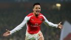 LONDON, ENGLAND - NOVEMBER 26:  Alexis Sanchez of Arsenal celebrates after scoring his team's second goal during the UEFA Champions League Group D match between Arsenal and Borussia Dortmund at the Emirates Stadium on November 26, 2014 in London, United Kingdom.  (Photo by Jamie McDonald/Getty Images)