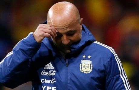 FILE - In this Argentina's coach Jorge Sampaoli rubs his head during the international friendly soccer match between Spain and Argentina at the Wanda Metropolitano stadium in Madrid. (AP Photo/Francisco Seco, File)