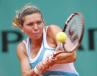 Romania's Simona Halep returns the ball to compatriot  during the Grils' single final match of the French Open tennis tournament, Sunday, June 8, 2008 at the Roland Garros stadium in Paris. (AP Photo/Laurent Baheux)