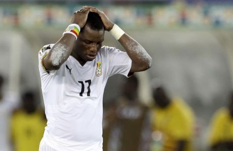 Ghana's Mubarak Wakaso reacts after  a teammate missed a penalty kick during their African Cup of Nations final soccer match against Ivory Coast in Bata, Equatorial Guinea, Sunday, Feb. 8, 2015. (AP Photo/Themba Hadebe)