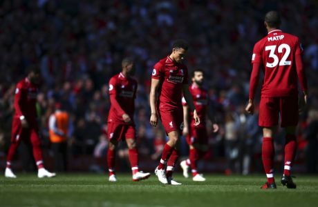 Liverpool players come out for the second half during the English Premier League soccer match between Liverpool and Wolverhampton Wanderers at the Anfield stadium in Liverpool, England, Sunday, May 12, 2019. Despite a 2-0 win over Wolverhampton Wanderers, Liverpool missed out on becoming English champion for the first time since 1990 because title rival Manchester City beat Brighton 4-1. (AP Photo/Dave Thompson)
