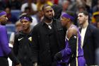 Los Angeles Lakers forward LeBron James (23) and Los Angeles Lakers guard Rajon Rondo (9) during the second half of an NBA basketball game in New Orleans, Sunday, March 31, 2019. The Lakers won 130-102. (AP Photo/Tyler Kaufman)