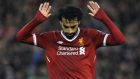 Liverpool's Mohamed Salah celebrates after scoring his side's second goal during the Champions League semifinal, first leg, soccer match between Liverpool and Roma at Anfield Stadium, Liverpool, England, Tuesday, April 24, 2018. (AP Photo/Rui Vieira)