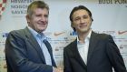 Newly appointed head coach of Croatia's national soccer team Niko Kovac, right, shakes hands with Davor Suker, head of the Croatian Soccer Federation, after a news conference in Zagreb, Croatia, Thursday, Oct. 17, 2013. Kovac succeeded Igor Stimac who was fired after a defeat from Scotland in a world Cup qualifier. (AP Photo/Darko Bandic) 