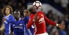 United's Paul Pogba, right, controls the ball in front of Chelsea's Willian during the English FA Cup quarterfinal soccer match between Chelsea and Manchester United at Stamford Bridge stadium in London, Monday, March 13, 2017. (AP Photo/Frank Augstein)