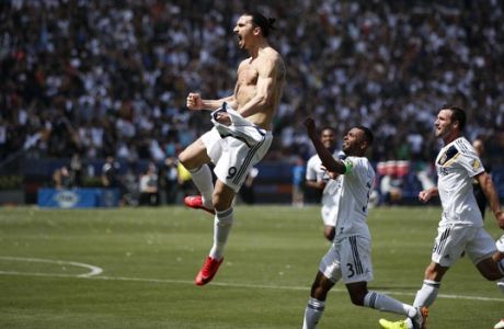 Los Angeles Galaxy's Zlatan Ibrahimovic, of Sweden, celebrates his goal during the second half of an MLS soccer match against the Los Angeles FC Saturday, March 31, 2018, in Carson, Calif. The Galaxy won 4-3. (AP Photo/Jae C. Hong)
