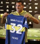 Carlos Tevez shows his Boca Juniors jersey, during his presentation as a new member of the team in Cardales, Argentina, Tuesday, Jan. 9, 2018. Tevez was officially presented today as part of the Boca Juniors team, for a third time in his career. (AP Photo/Natacha Pisarenko)