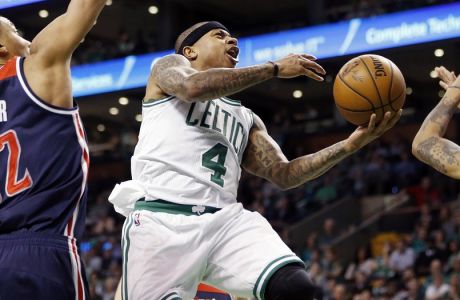 Boston Celtics' Isaiah Thomas (4) goes up to shoot against Washington Wizards' Otto Porter Jr. (22) during the second quarter of a second-round NBA playoff series basketball game, Sunday, April, 30, 2017, in Boston. (AP Photo/Michael Dwyer)