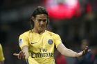 PSG's Roberto Edison Cavani celebrates his side's 2nd goal during the French League One soccer match between Guingamp and PSG at the Roudourou stadium in Guingamp, western France, Sunday, Aug. 13, 2017. Neymar makes his long-awaited debut with Paris Saint-Germain on Sunday in the small Brittany town of Guingamp. (AP Photo/Kamil Zihnioglu)