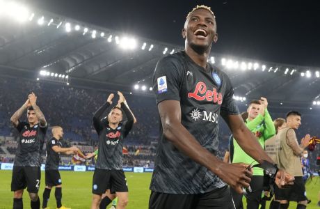 Napoli's Victor Osimhen celebrates at the end of a Serie A soccer match between Roma and Napoli, at the Olimpic stadium in Rome, Sunday, Oct. 23, 2022. (AP Photo/Andrew Medichini)